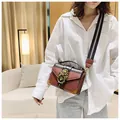 Street fashion lion head crossbody bag with rivets and striped fabric shoulder strap - Pink