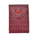 Small burgundy stone pattern wallet featuring cute red cherry metal buckle detail - Red