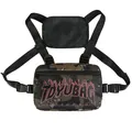 Hip hop chest bag with jungle camouflage print and pink flame logo detail - Camouflage
