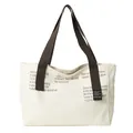 Large casual cream canvas tote bag with brown wide straps and stylish graphic text - White