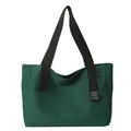 Large dark green canvas tote bag with black wide straps and minimalist typography print - Green