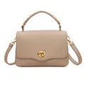 Minimalist beige pebble leather crossbody bag with circular gold twist lock closure - Khaki