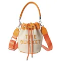 Straw bucket bag with orange leather trim and THE BUCKET embroidery for women - Orange