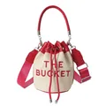 Straw bucket bag in beige and red featuring THE BUCKET embroidery with wide strap - Red