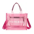 Neon pink translucent mesh tote bag with white TOTE BAG lettering and inner pouch - Pink