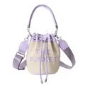 Fashion straw bucket bag in lilac purple with adjustable strap and THE BUCKET embroidery - Purple