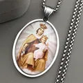 Pendentif Vierge Marie et Enfant en argent poli avec chaîne sur velours gris - Argent