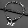 Macro view of triple moon goddess pendant with pentagram on stainless steel box chain - Silver