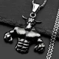 Detailed macro view of a stainless steel minotaur pendant with textured box chain necklace - Silver