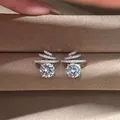 Silver drop earrings featuring round sparkling moissanite stones and spiral pave designs - Spiral Moissanite-Look Studs (ED210)