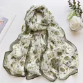 Lightweight long white chiffon scarf with green floral print and dark green edges - Quicksand Rose Green