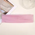 Pink elastic sports headband in a wide-brimmed design for yoga and fitness running - Pink