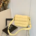 Quilted crossbody bag in pale yellow nylon with adjustable wide shoulder strap - Yellow