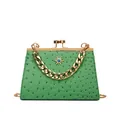 Smaragdgrüne Handtasche aus Straußenleder mit goldenem Sonnenornament und Kette - Grün
