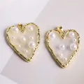 Macro detail of 18K gold plated heart charm with embedded pearls and wavy metal texture - Heart (Medium)