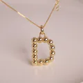 Collar chapado en oro de 18K con colgante de letra D estilo globo con cuentas pulidas - Letra D