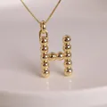 18K gold plated necklace featuring a high-gloss balloon style letter H pendant - Letter H