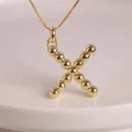 Elegant 18K gold-plated balloon letter X pendant necklace with polished sphere texture - Letter X