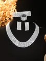 Macro view of silver bridal jewelry set with sparkling rhinestones on a velvet bust - Silver Wide Diamond Row Necklace Bracelet Ring Earrings Set (PJ--T0280)