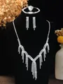 Detailed view of silver crystal fringe necklace and bridal jewelry set on black display - Silver Tassel Rhinestone Necklace Bracelet Earrings Ring Set (PJ--T0259)