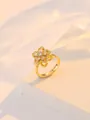Detailed close-up of golden rotating flower pendant with sparkling zircon crystals - Zirconia Rotating Flower Ring (J0204)