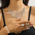 Sparkling silver rhinestone jewelry set with necklace, bracelet, ring and earrings - Silver Wave Hollow Tassel Necklace Bracelet Earrings Ring Set (PJ--T0241)