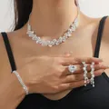 Luxury silver bridal jewelry set with pear-cut ring and sparkling rhinestone necklace - Silver Pear Diamond Tassel Necklace Bracelet Earrings Ring Set (PJ--T0254)