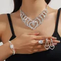 Elegant silver-toned bridal jewelry set with heart-shaped sparkling rhinestones - Silver Heart Necklace Bracelet Earrings Ring Set (PJ--T0263)