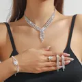 Silver bridal jewelry set with sparkling rhinestones including necklace and earrings - Silver Marquise Diamond Tassel Necklace Bracelet Ring Earrings Set (PJ--T0289)