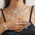 Elegant silver bridal jewelry set with sparkling crystals and floral necklace pendant - Silver Flower Tassel Necklace Bracelet Ring Earrings Set (PJ--T0290)