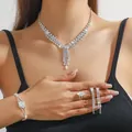 Elegant 4-piece silver bridal jewelry set with sparkling rhinestones and tassels - Silver Tassel Marquise Diamond Necklace Bracelet Ring Earrings Set (PJ--T0291)