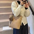 Large woven tote bag in light brown with leopard print charm for casual commute - Khaki With Rabbit Pendant
