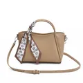 Fashionable tan bucket bag with embossed leather texture and heart pattern scarf detail - Khaki