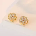 Elegante goldene Blumenstecker mit weißen Zirkonia im koreanischen minimalistischen Stil - Gold Rotierende Herzohrringe