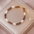 Collier en perles baroques avec pierres oeil de tigre et chaîne d'extension coeur doré - Bracelet / TS0507 Bracelet Perle d'Eau Douce Œil de Tigre