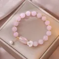 Elegantes Armband mit rosa Kristallperlen, Süßwasserperle und Muschelblüten-Anhänger - Rosenquarz Süßwasserperle Blumenstil (TS0143)