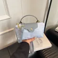 Light blue and grey contrast nylon tote bag with leather straps and gold metal hardware - Light Blue