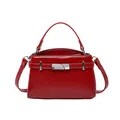 Bolso Kelly de charol rojo con hebilla plateada y correa ajustable para el hombro - Rojo