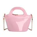 Chic pink jelly handbag for women with golden chain strap and sleek glossy finish - Pink