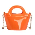 Fashionable orange glossy jelly handbag with elegant gold chain strap for women - Orange