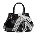 Black glossy patent leather handbag with white lace bow and silver metallic charms - With Pendant / Black