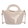 Fashionable beige jelly handbag with glossy finish and gold chain shoulder strap - Beige