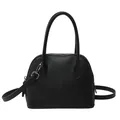 Classic black crossbody shell bag with litchi grain texture and silver hardware - Black
