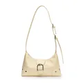 Cream crescent shoulder bag in textured faux leather with silver horseshoe buckle detail - White
