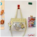 Detalle del bolso Ita amarillo con hebilla de metal de corazón y ventana de PVC transparente - Amarillo