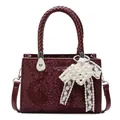 Bolso burdeos con textura de serpiente, asas trenzadas y amuleto de perlas - Sin Colgante / Rojo Ancorra