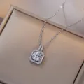 Elegant silver titanium necklace with square zircon pendant in a champagne box - Square Halo Pendant Necklace / Steel