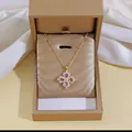 Star-shaped clover necklace with purple heart zircons in a gold luxury gift box - Purple Rotating Necklace