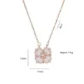 Kleeblatt Halskette aus Roségold mit weißen Herzmuscheln und glitzernden Zirkonia - Roségold Kleeblatt (X0048) / Roségold
