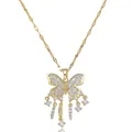 Detailed close-up of golden butterfly pendant with sparkling cubic zirconia and tassels - Gold Micro-Pave Star Butterfly Tassel Style (X1462) / Gold